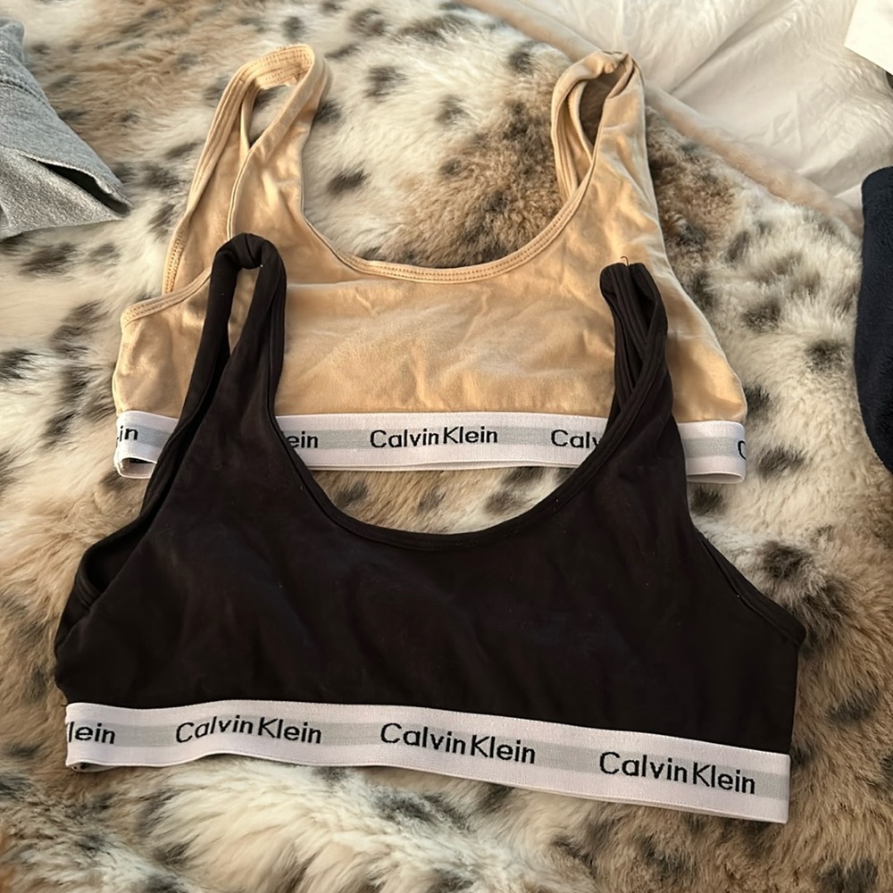 Two Calvin Klein bralettes , they are a kids large so 12/-14 barely worn
